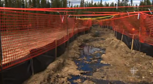 Image 1241 ‘Bitumen leaking through the ground at the Cold Lake site, shown in a video captured by CBC.’