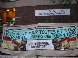 "City without Borders" banner from community demonstration (J. Lapierre)
