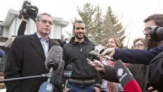 Omar Khadr's and his lawyer Dennis Edney speak to media outside Edney's home in Edmonton, Alberta, Thursday, May 7, 2015. The former Guantanamo Bay prisoner had his first taste of freedom in almost 13 years Thursday after an Alberta judge rejected a last-ditch attempt by the federal government to block his release. (Jason Franson/The Canadian Press via AP) MANDATORY CREDIT